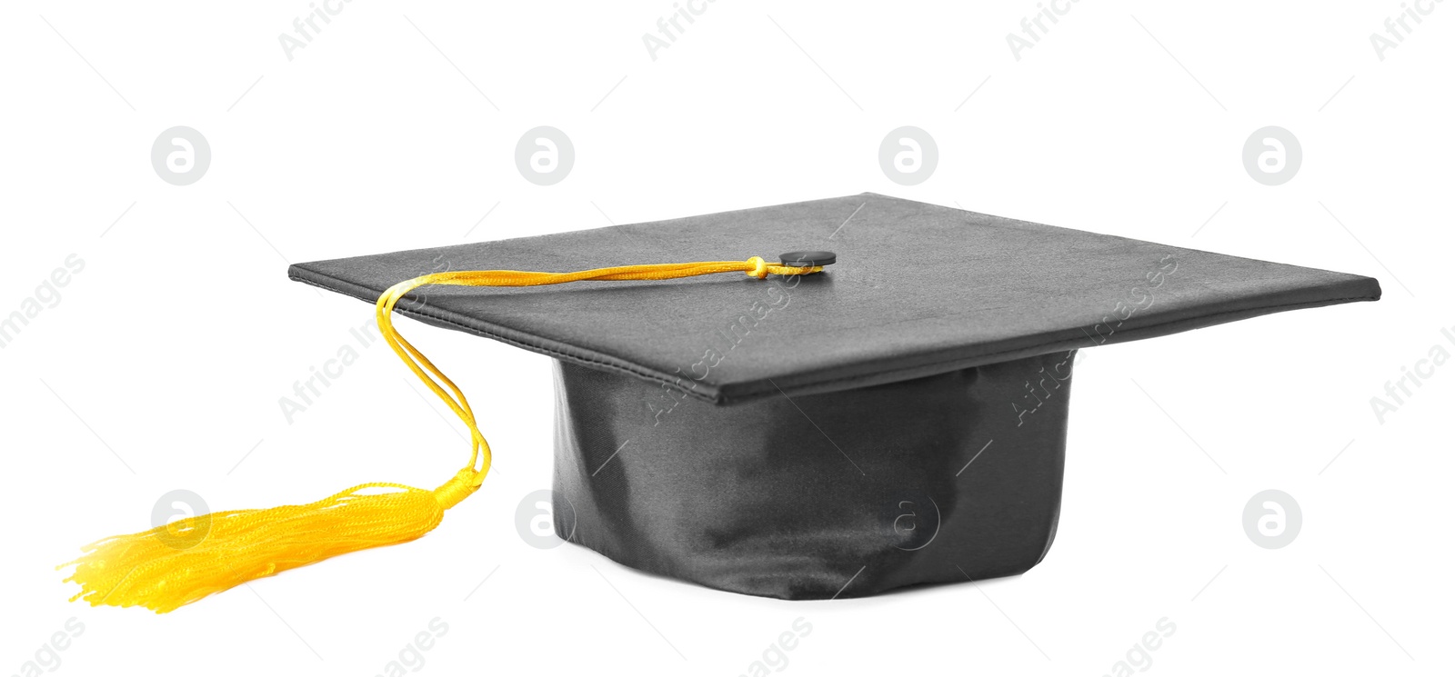 Photo of Graduation hat with gold tassel isolated on white