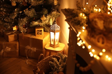 Christmas tree and gifts in beautiful room interior