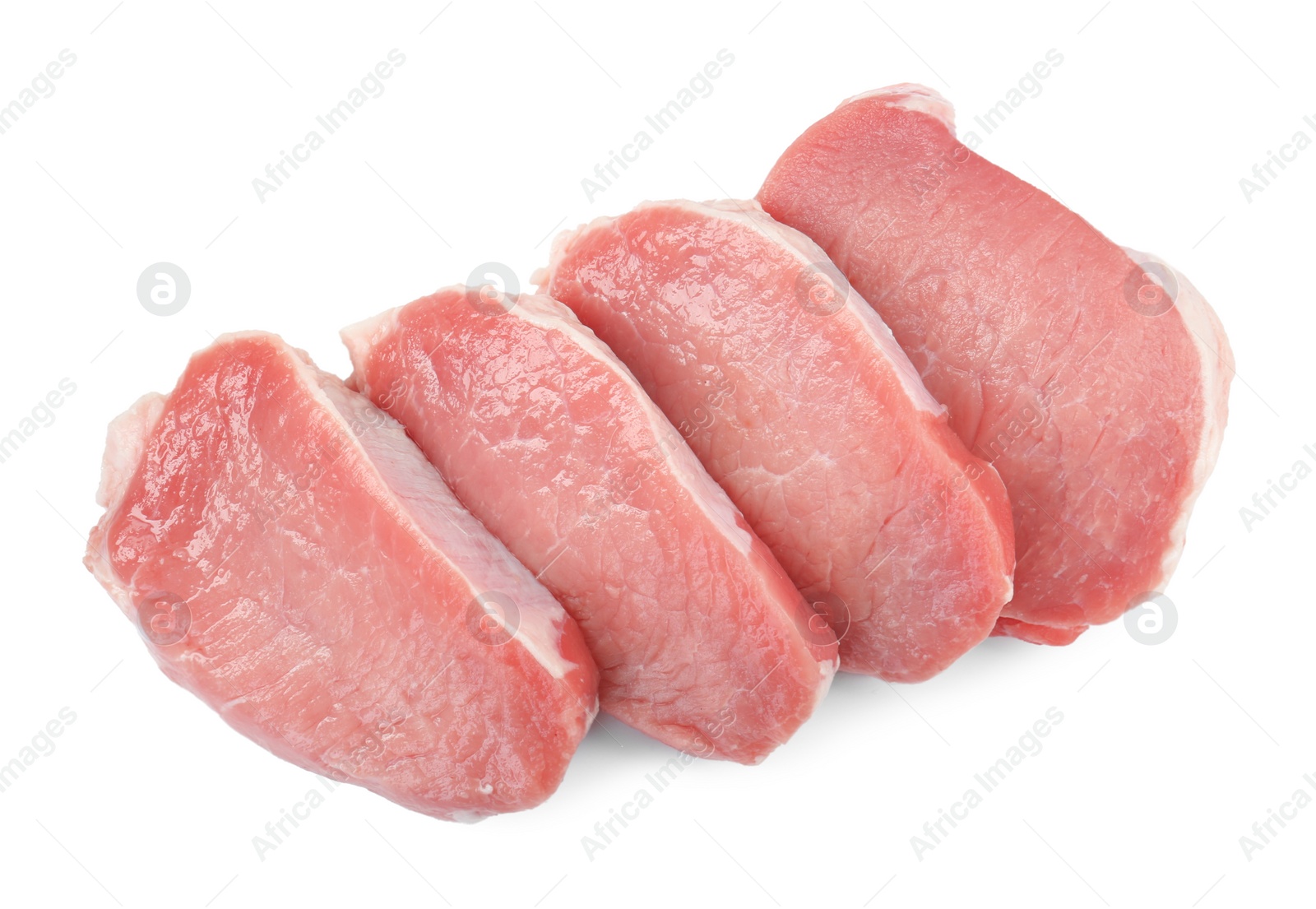 Photo of Pieces of raw pork meat isolated on white, top view