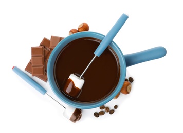 Photo of Composition with fondue pot, dark chocolate and marshmallow on white background, top view