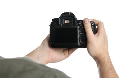 Photo of Photographer holding modern camera on white background, closeup