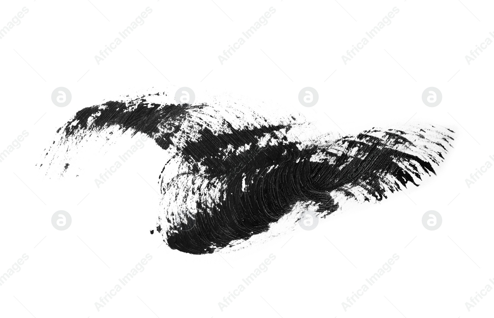 Photo of Smear of black mascara for eyelashes on white background