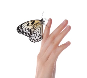 Photo of Woman holding beautiful rice paper butterfly on white background, closeup