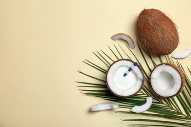 Composition with coconut milk and fresh nuts on color background, top view