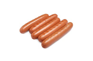 Photo of Tasty fresh grilled sausages on white background. Ingredients for hot dogs