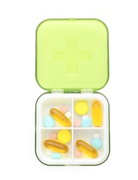 Photo of Plastic box with different pills isolated on white, top view