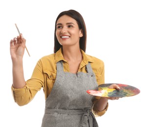 Photo of Young woman drawing with brush on white background