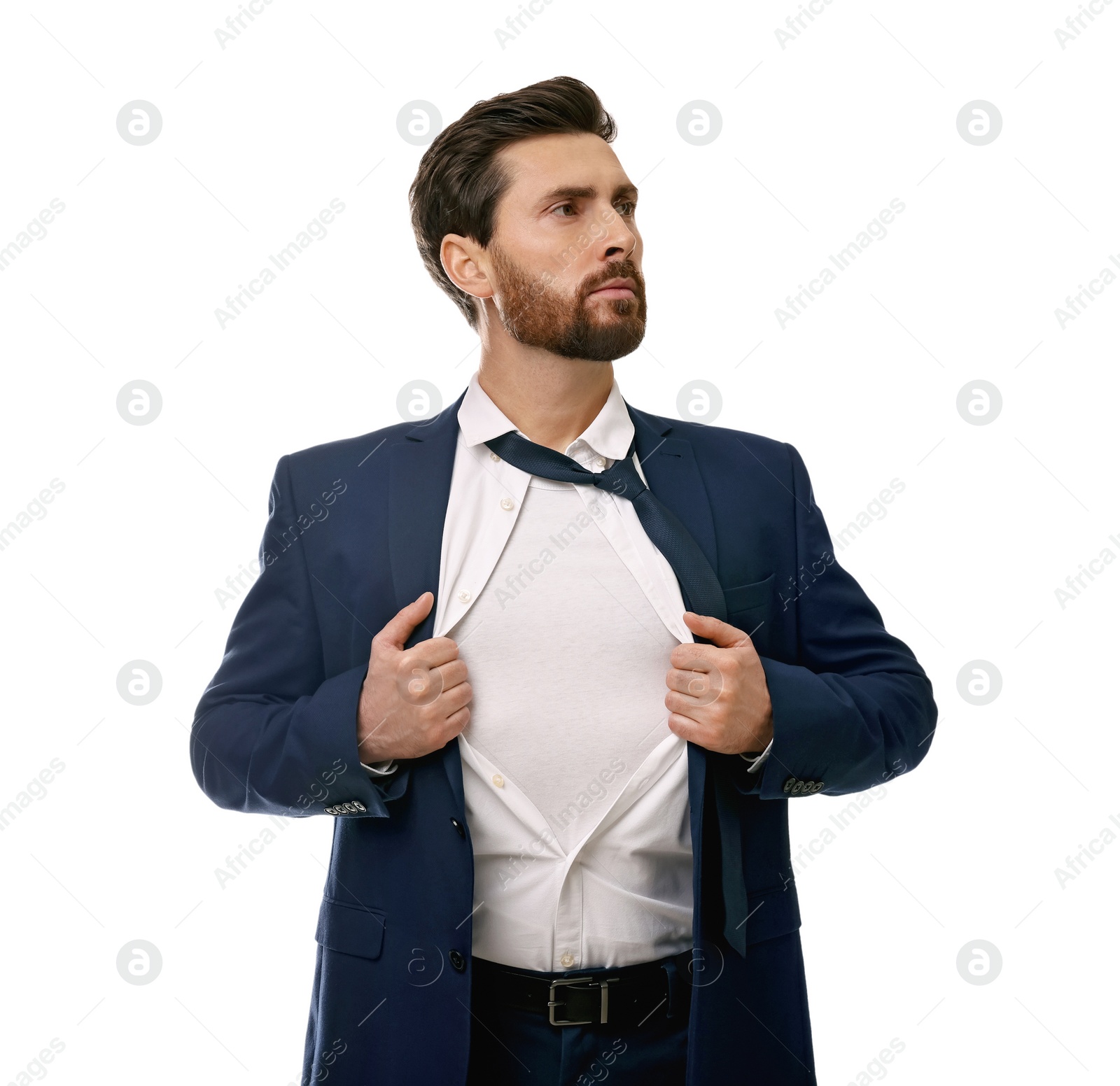 Photo of Confident businessman wearing superhero costume under suit on white background