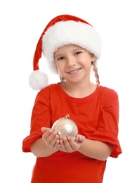 Cute little child wearing Santa hat with Christmas decoration on white background