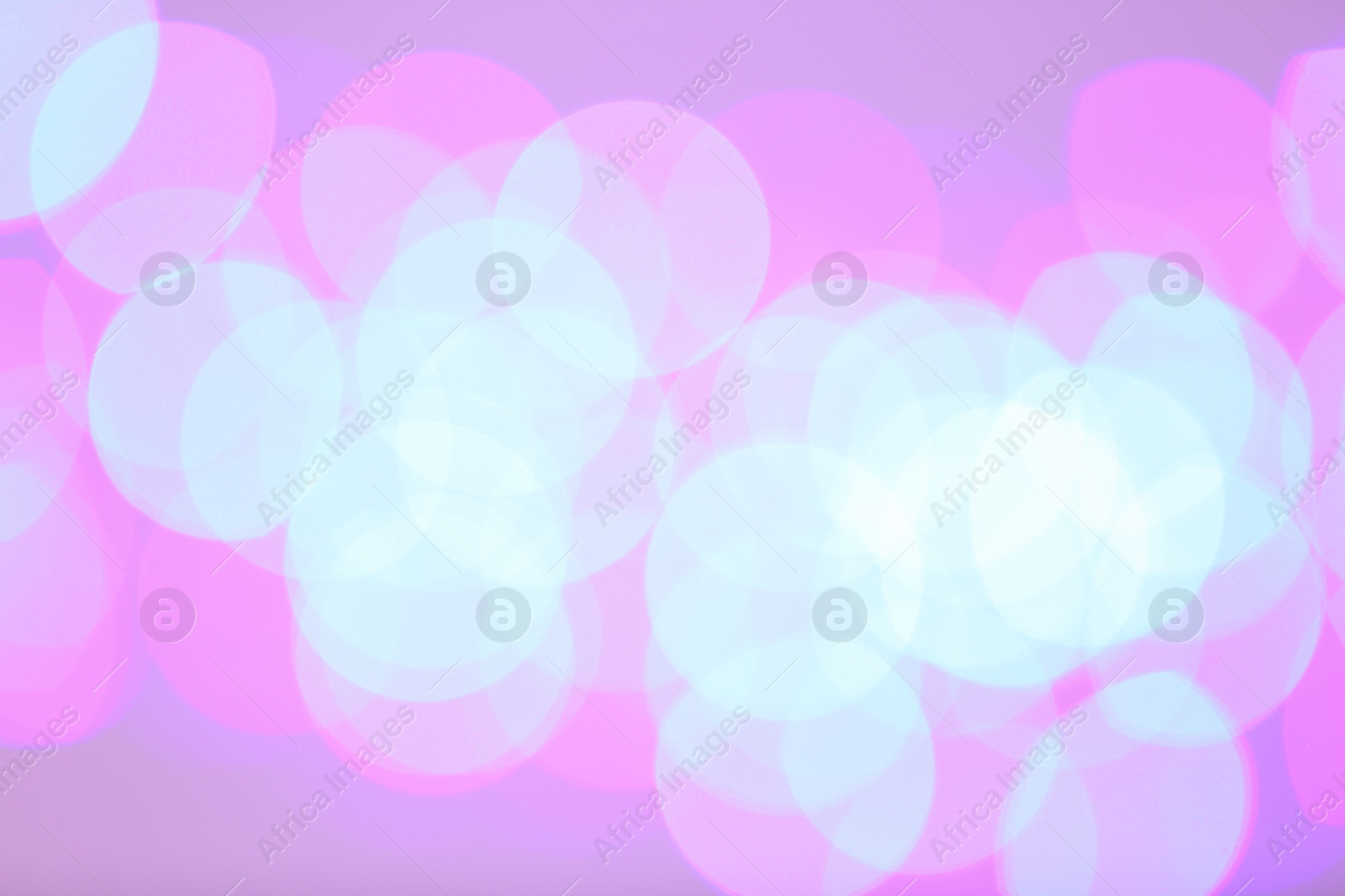 Photo of Beautiful glowing lights as background. Bokeh effect