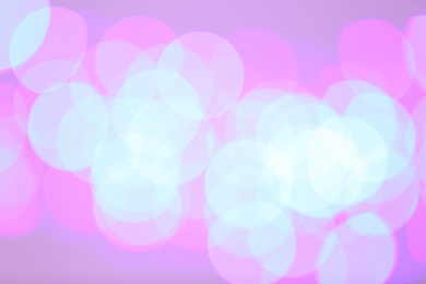 Photo of Beautiful glowing lights as background. Bokeh effect