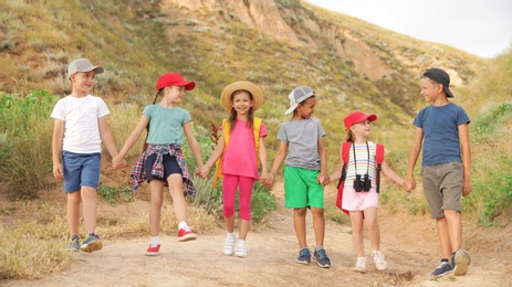 Cute little children outdoors on summer day. Camping trip