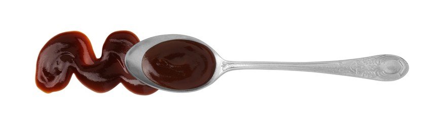 Tasty barbecue sauce and spoon isolated on white, top view