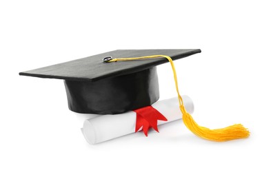 Photo of Graduation hat and diploma on white background