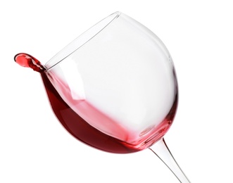 Glass with delicious red wine on white background