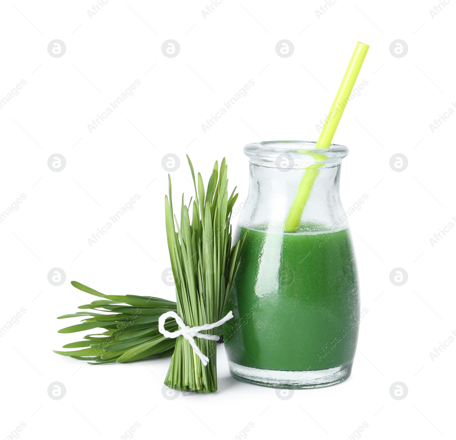 Bottle of wheat grass juice and sprouts on white background Photo of Bottle of wheat grass juice and sprouts on white background