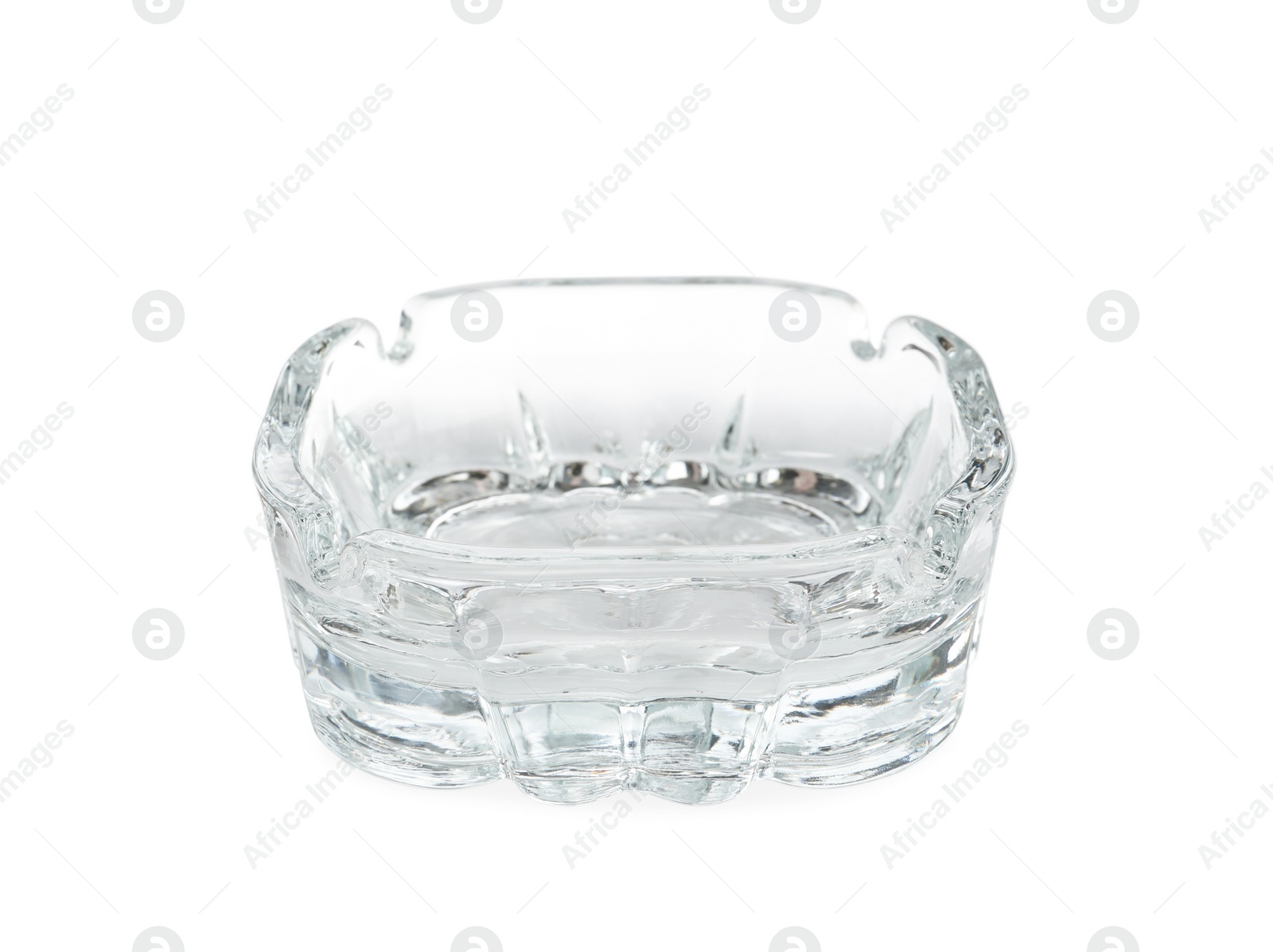 Photo of One empty glass ashtray isolated on white