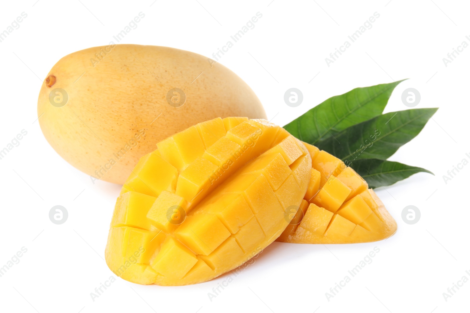 Photo of Fresh juicy mango and leaves isolated on white