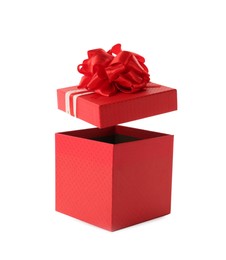 Photo of Red gift box and lid with bow on white background
