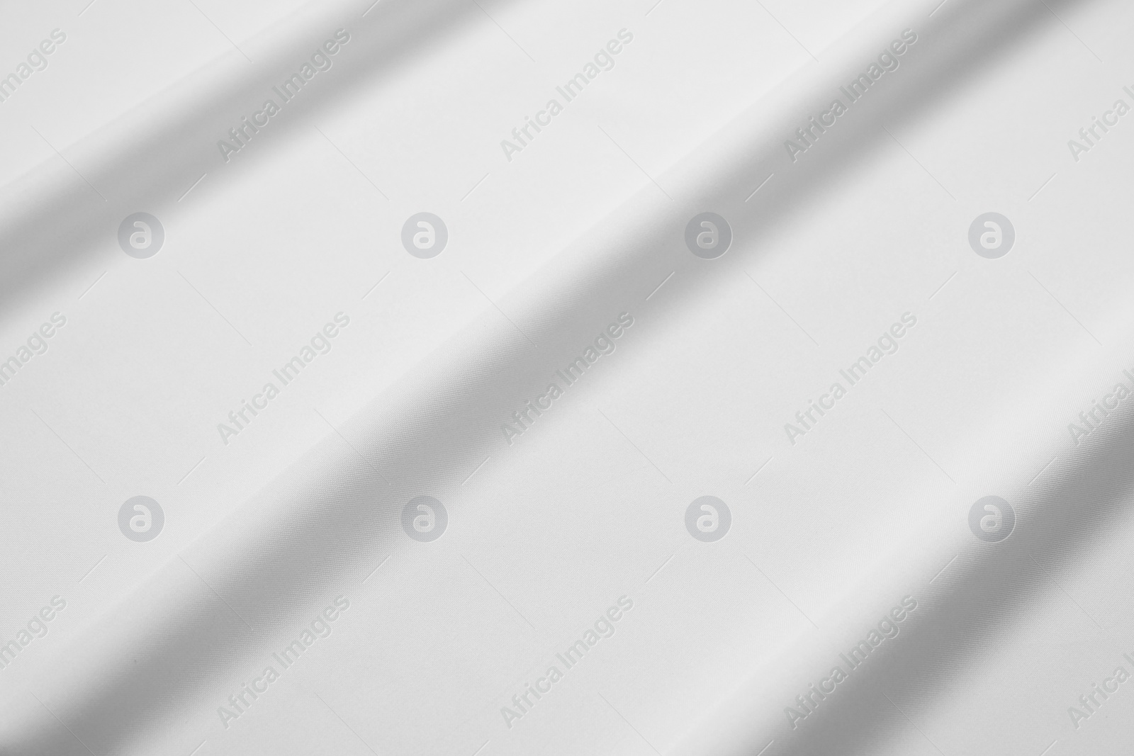 Photo of Texture of blank white flag as background, top view. Mockup for design