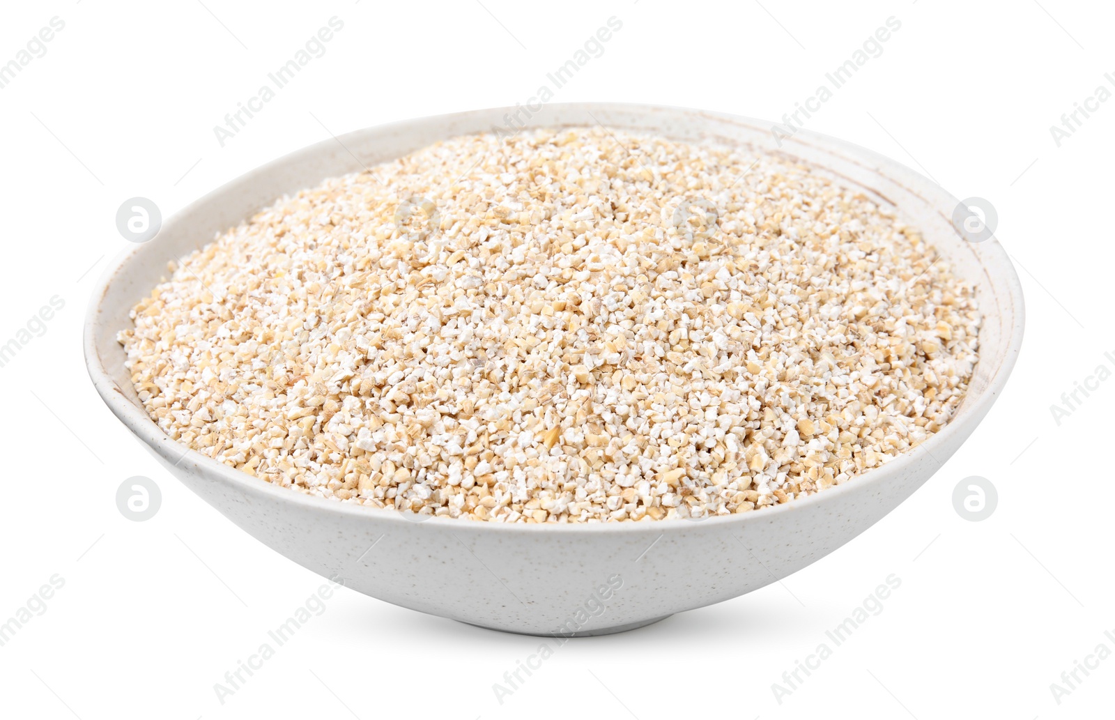Photo of Dry barley groats in bowl isolated on white