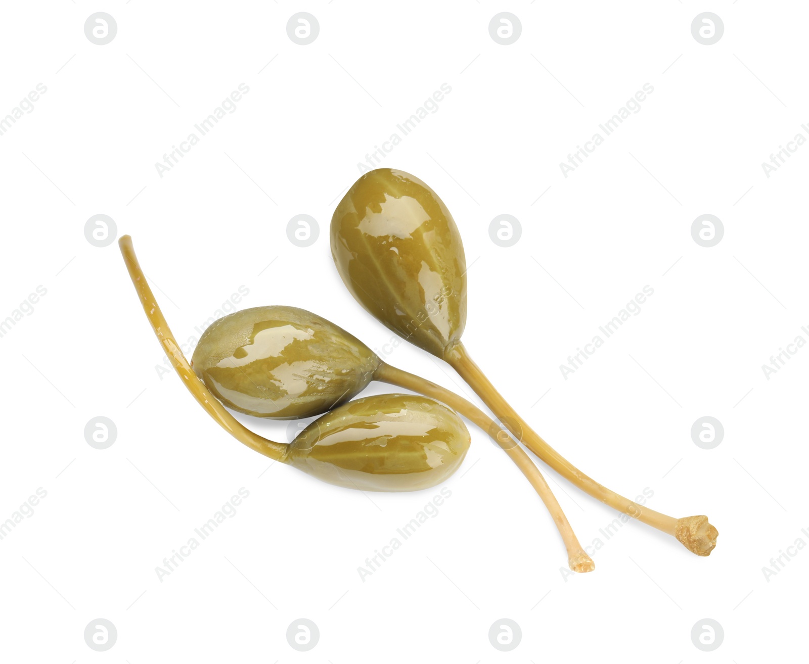 Photo of Three delicious pickled capers on white background, top view