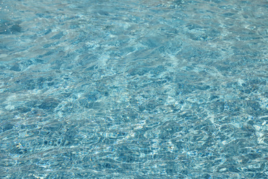 Swimming pool with clean blue water as background. Summer vacation