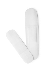 Photo of Medical sticking plasters isolated on white. First aid item