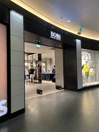 Photo of WARSAW, POLAND - JULY 17, 2022: Hugo Boss clothing store in shopping mall