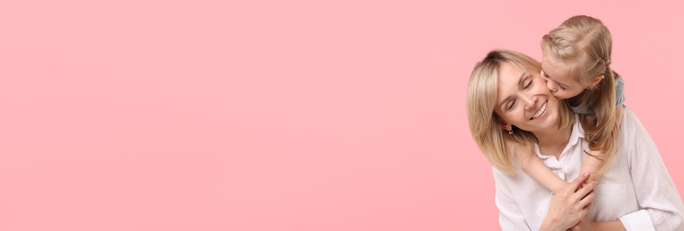 Image of Happy mother and daughter on light pink background, space for text. Banner design