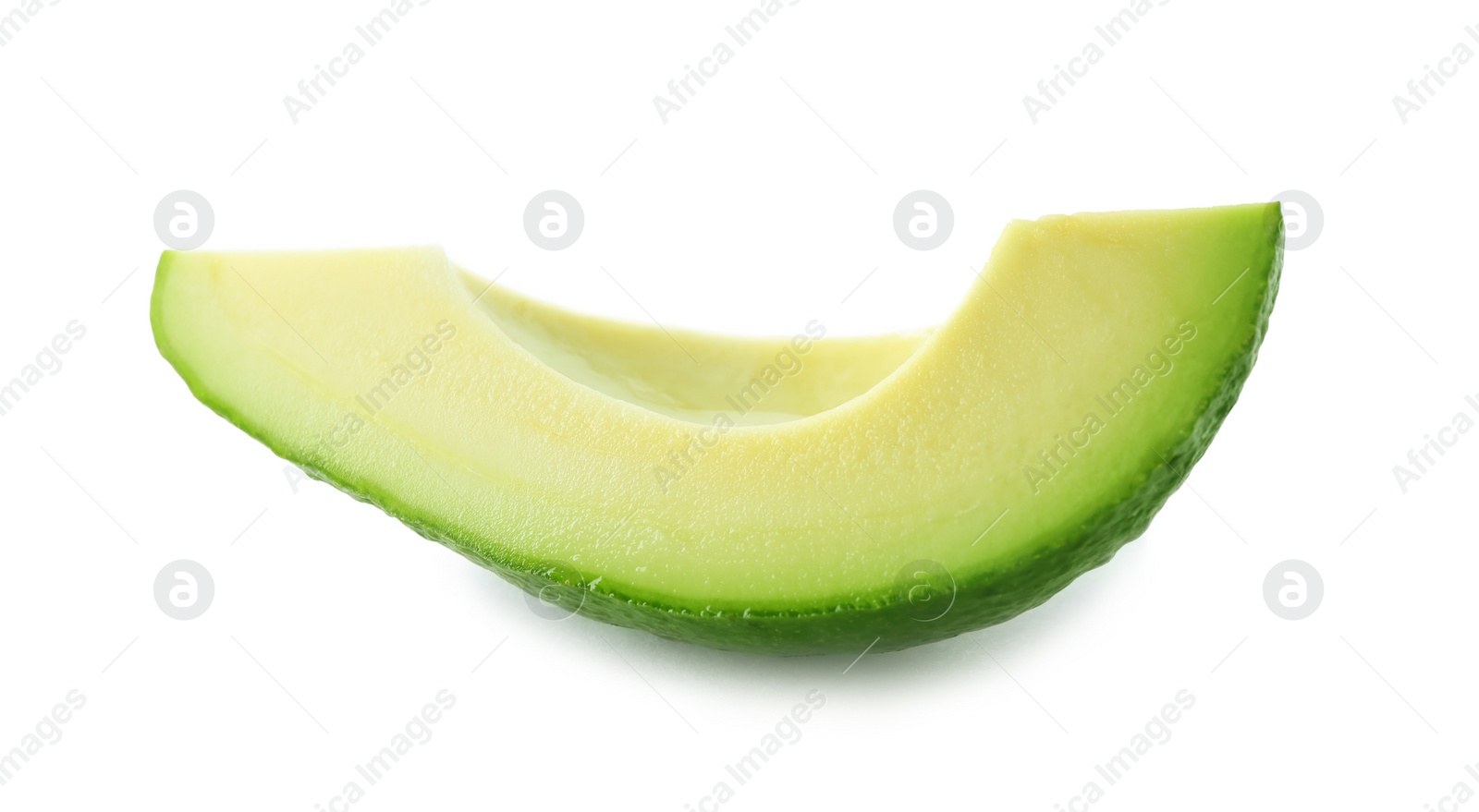 Photo of Slice of ripe avocado isolated on white