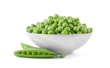 Photo of Bowl with green peas on white background