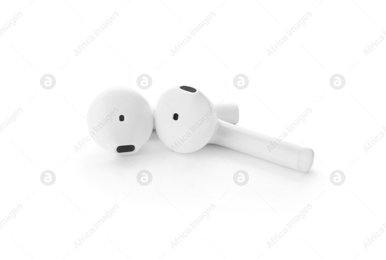 Photo of Pair of modern wireless earphones on white background