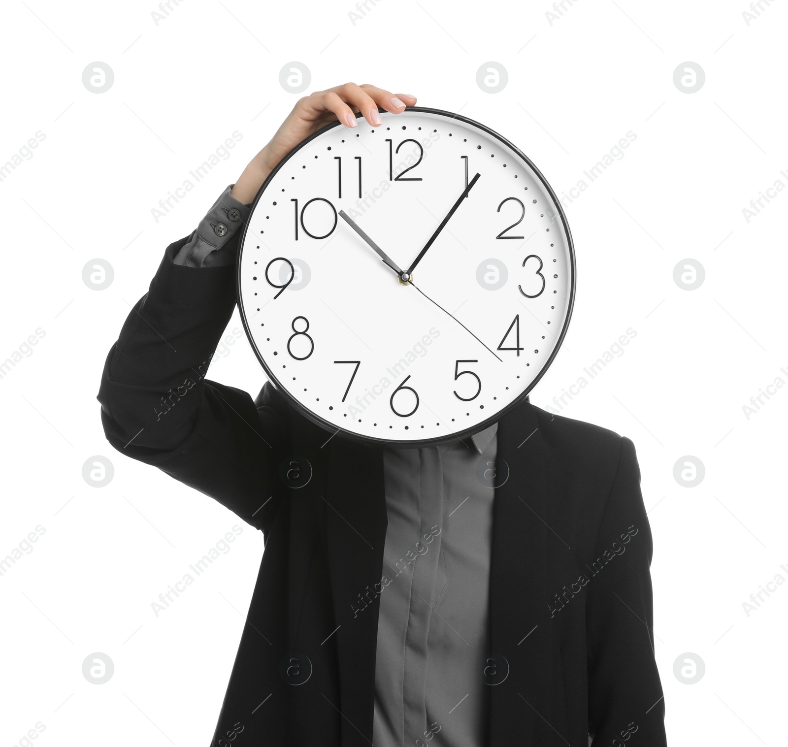 Photo of Businesswoman holding clock on white background. Time management