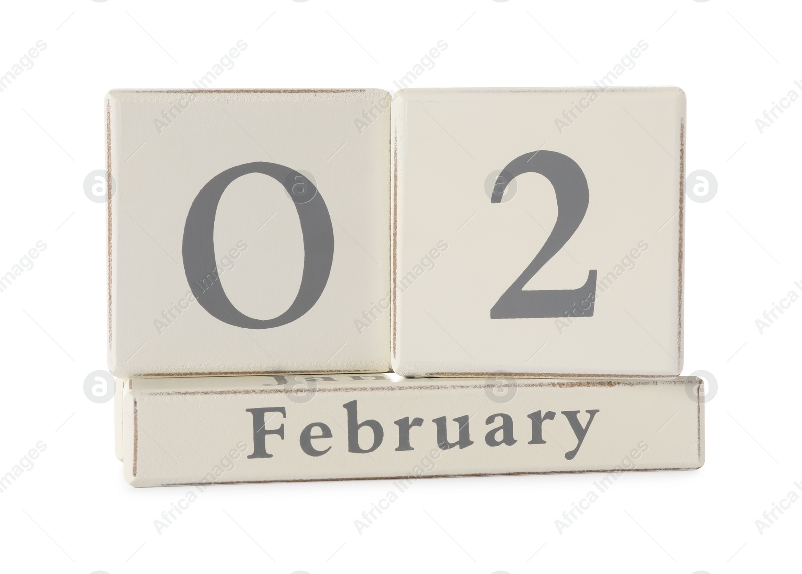 Photo of Wooden block calendar with date February 2nd on white background. Groundhog day