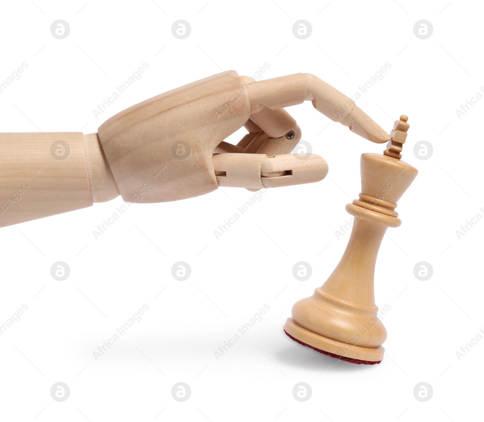 Photo of Robot touching chess piece isolated on white. Wooden hand representing artificial intelligence