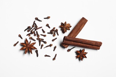 Photo of Different spices on white table, flat lay