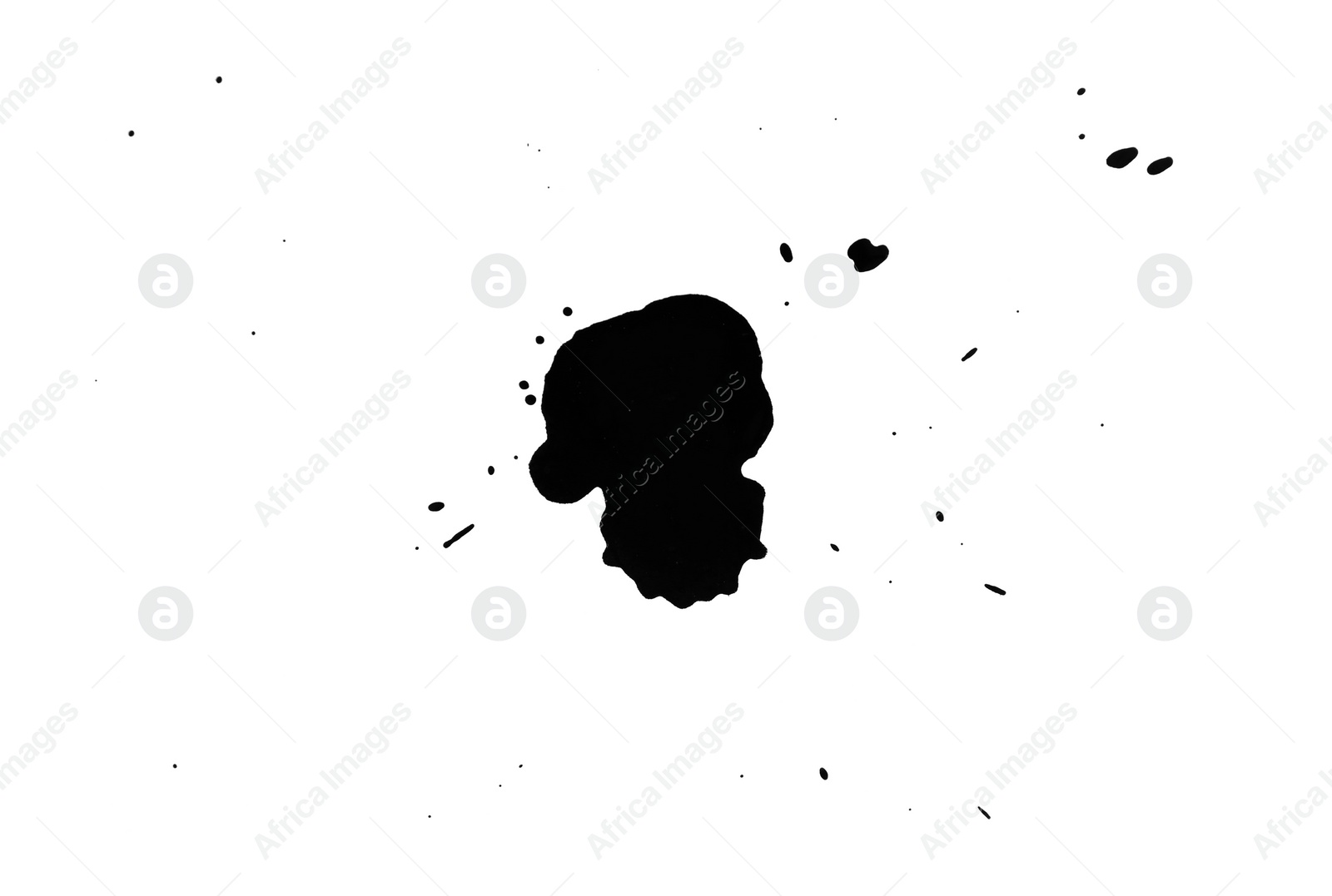 Photo of Blots of black ink isolated on white, top view