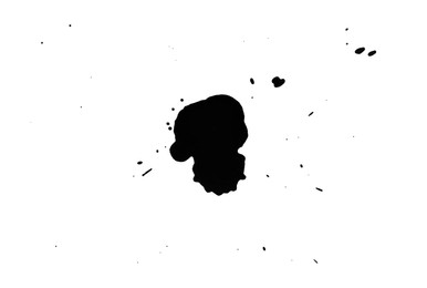 Photo of Blots of black ink isolated on white, top view