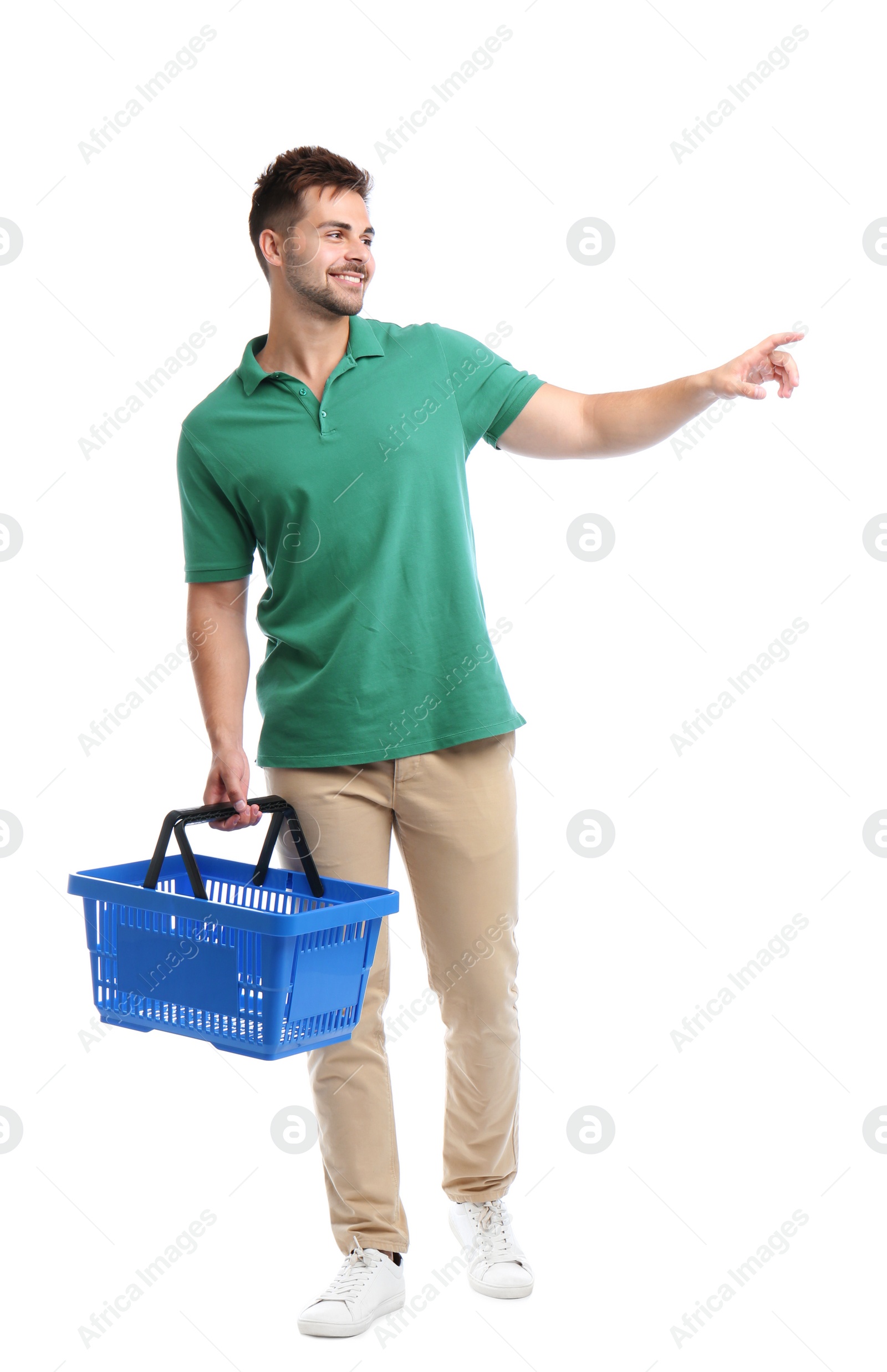 Photo of Young man with empty shopping basket isolated on white