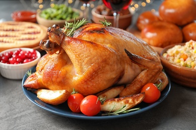 Traditional festive dinner with delicious roasted turkey served on table