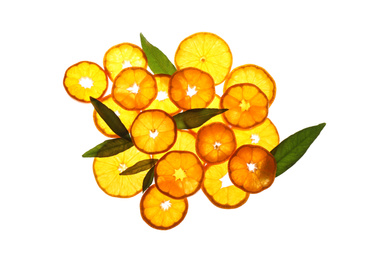 Photo of Slices of fresh ripe tangerines and leaves isolated on white, top view. Citrus fruit