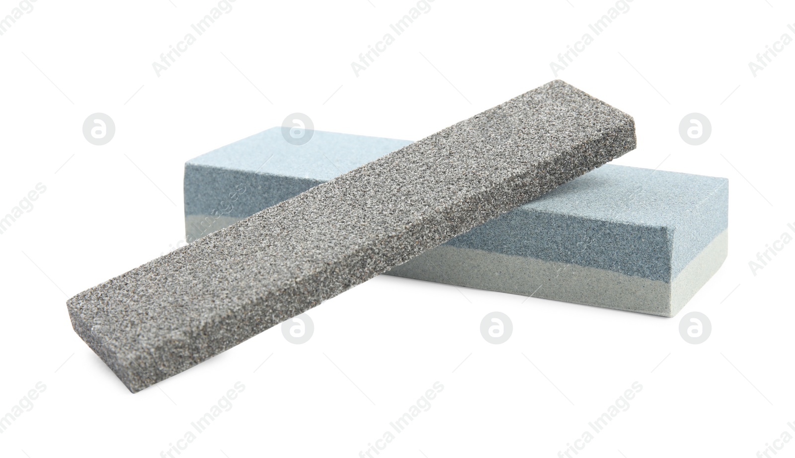 Photo of Sharpening stones for knife on white background