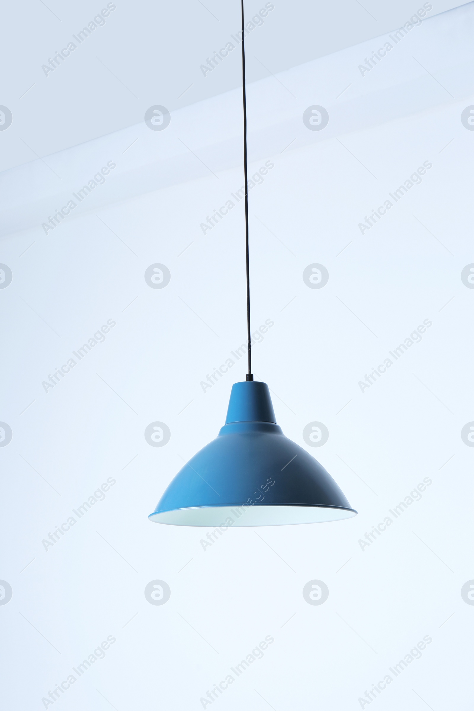 Photo of Modern hanging lamp, isolated on white. Idea for interior design