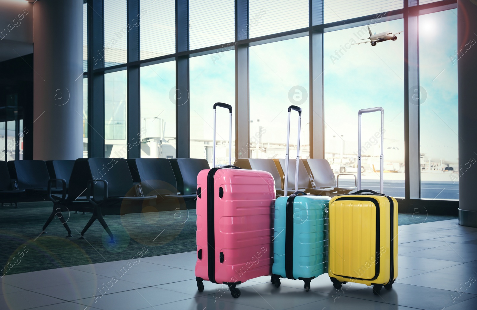 Image of Travel suitcases in airport terminal. Summer vacation