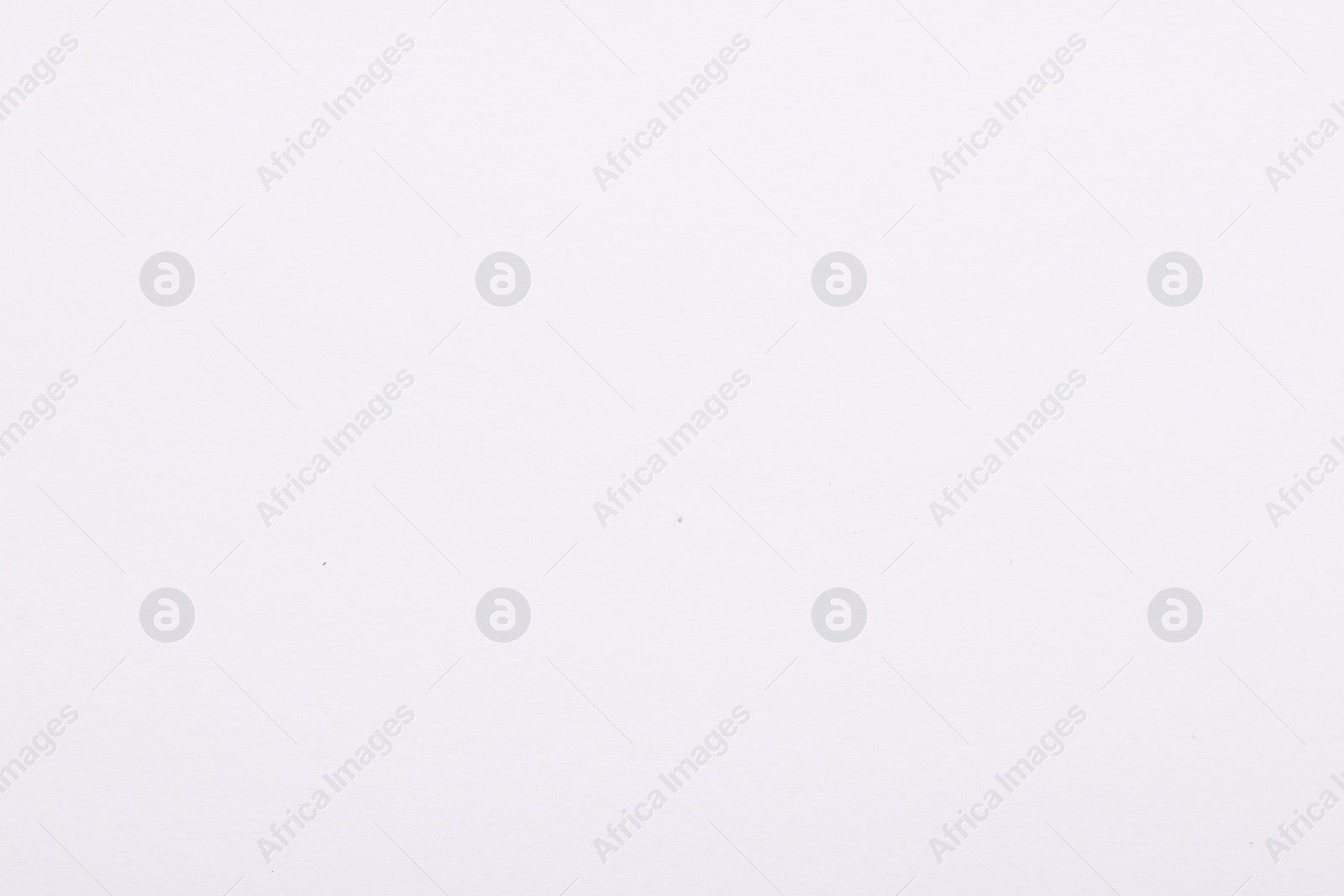 Photo of Texture of white paper sheet as background, top view