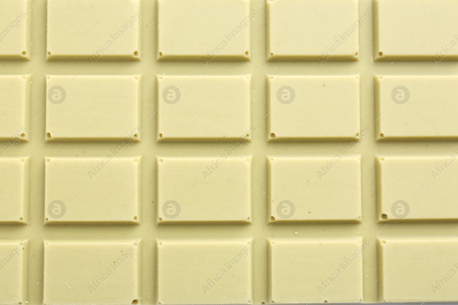 Photo of Tasty matcha chocolate bar as background, top view