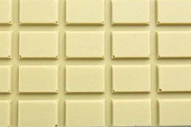 Tasty matcha chocolate bar as background, top view