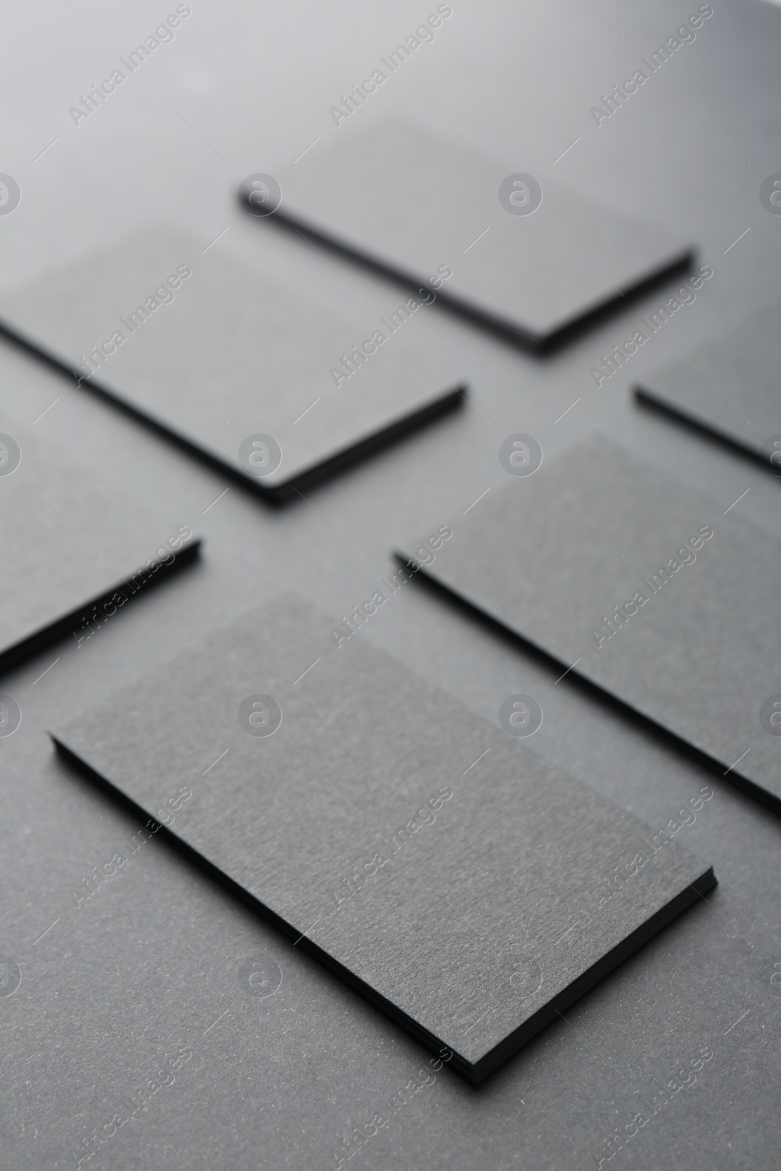 Photo of Blank business cards on black background. Mockup for design