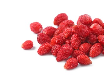 Photo of Ripe red wild strawberries isolated on white